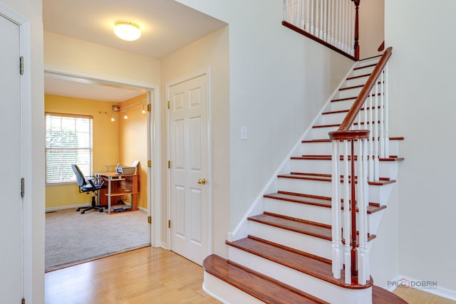 911 Waterford Ln, Elk Grove Village, IL 60007 - stairway with wood finished floors and baseboards