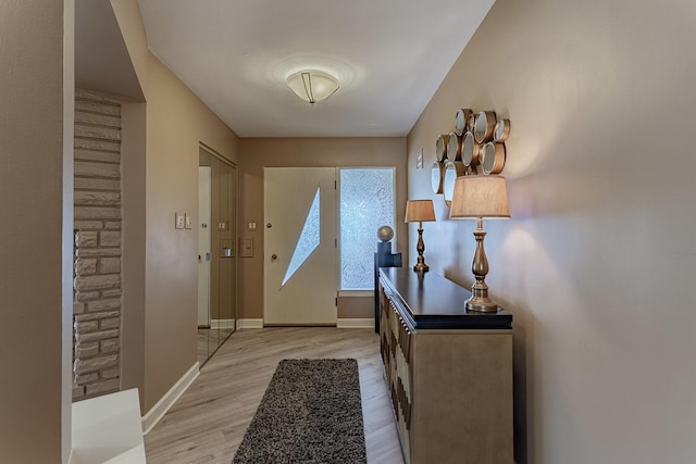 711 E Greenview Rd, Itasca, IL 60143 - entryway featuring light wood-style flooring and baseboards