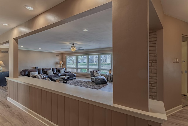 711 E Greenview Rd, Itasca, IL 60143 - living room with light wood-style flooring, ceiling fan, recessed lighting, and crown molding