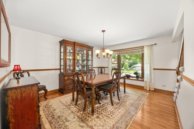 13542 S Erin Dr, Homer Glen, IL 60491 - dining room with a chandelier and light wood-style floors