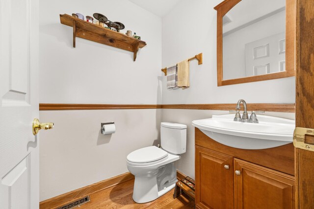 13542 S Erin Dr, Homer Glen, IL 60491 - half bathroom with vanity and wood finished floors