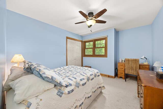 13542 S Erin Dr, Homer Glen, IL 60491 - bedroom with a closet, light colored carpet, and a ceiling fan
