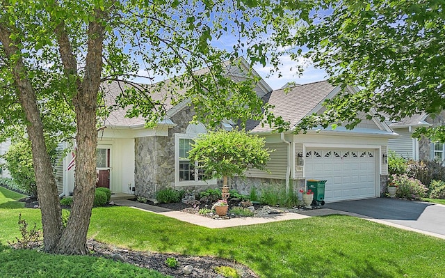 11642 Sunderlin Dr, Huntley, IL 60142 - view of front of home featuring stone siding, driveway, an attached garage, and a front yard