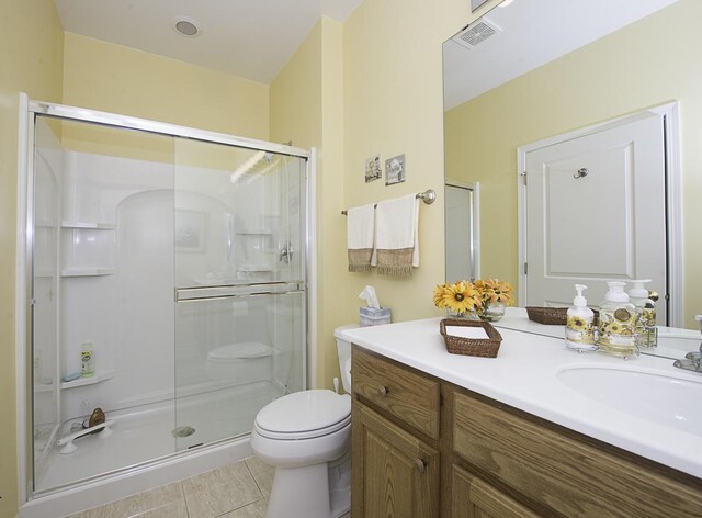 11642 Sunderlin Dr, Huntley, IL 60142 - full bathroom featuring vanity, a stall shower, and tile patterned flooring