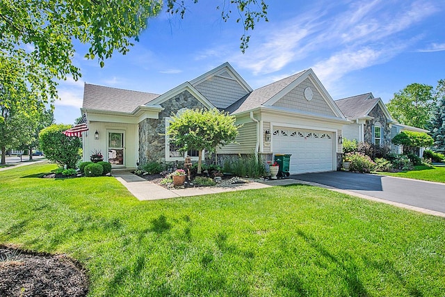 11642 Sunderlin Dr, Huntley, IL 60142 - view of front of house featuring stone siding, a garage, driveway, and a front yard