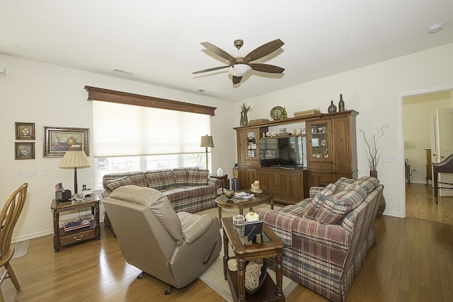 11642 Sunderlin Dr, Huntley, IL 60142 - living room featuring ceiling fan and wood finished floors