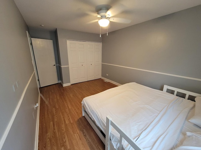 310 Partridge Ln, Wheeling, IL 60090 - bedroom with wood finished floors, a closet, and a ceiling fan