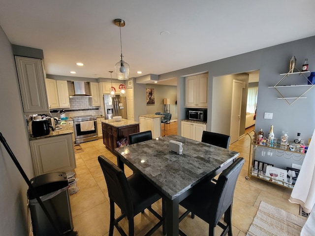 310 Partridge Ln, Wheeling, IL 60090 - dining space featuring light tile patterned floors and recessed lighting