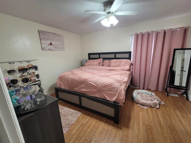 310 Partridge Ln, Wheeling, IL 60090 - bedroom featuring wood finished floors and a ceiling fan