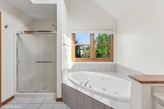 3175 Wild Meadow Ln, Aurora, IL 60504 - full bathroom with a stall shower, a tub with jets, vaulted ceiling, and tile patterned flooring