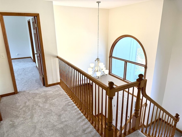 3175 Wild Meadow Ln, Aurora, IL 60504 - staircase with carpet and a chandelier