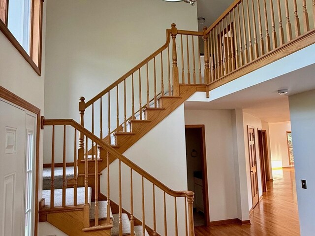 3175 Wild Meadow Ln, Aurora, IL 60504 - stairway with wood finished floors and a high ceiling