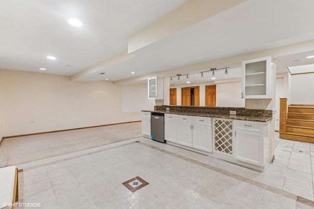 3175 Wild Meadow Ln, Aurora, IL 60504 - kitchen with white cabinetry, inlaid floor details, glass insert cabinets, stainless steel dishwasher, and open floor plan