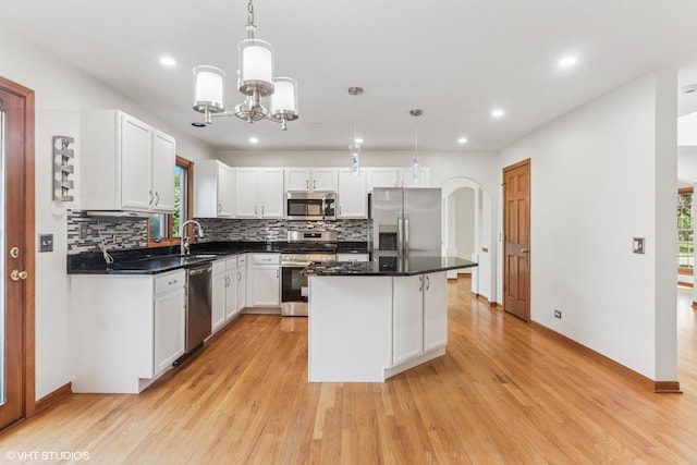 3175 Wild Meadow Ln, Aurora, IL 60504 - kitchen featuring appliances with stainless steel finishes, plenty of natural light, tasteful backsplash, and recessed lighting