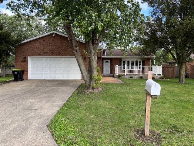 1038 Ruth Crane Dr, Rantoul, IL 61866 - single story home with brick siding, driveway, and an attached garage