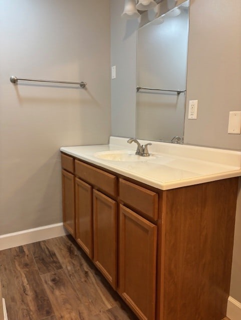 1038 Ruth Crane Dr, Rantoul, IL 61866 - bathroom featuring vanity and wood finished floors