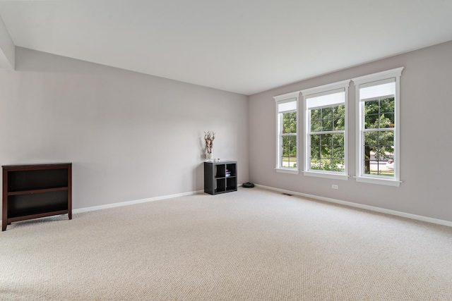 17857 Wilker Dr, Lockport, IL 60441 - unfurnished living room featuring baseboards and carpet floors