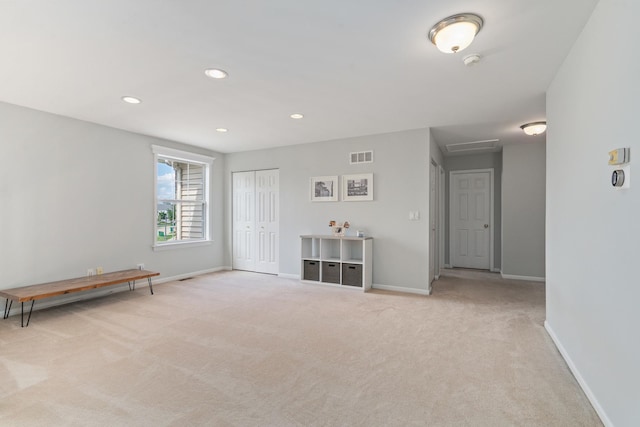 17857 Wilker Dr, Lockport, IL 60441 - spare room featuring light colored carpet, attic access, recessed lighting, and a smoke detector