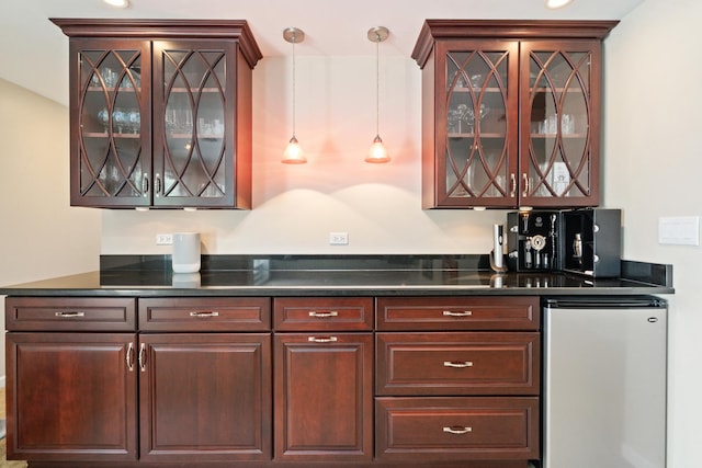 17857 Wilker Dr, Lockport, IL 60441 - indoor wet bar featuring refrigerator and hanging light fixtures