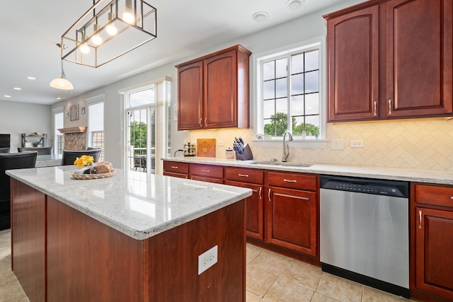 17857 Wilker Dr, Lockport, IL 60441 - kitchen featuring dishwasher, plenty of natural light, backsplash, light stone counters, and recessed lighting