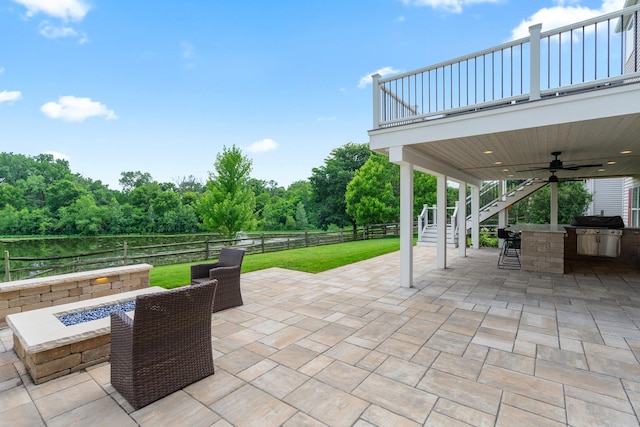 17857 Wilker Dr, Lockport, IL 60441 - fenced backyard with a fire pit, stairs, ceiling fan, and a patio