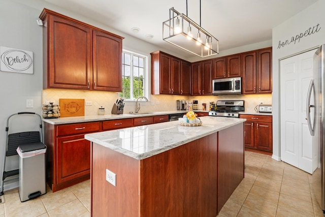 17857 Wilker Dr, Lockport, IL 60441 - kitchen with appliances with stainless steel finishes, light stone countertops, light tile patterned floors, backsplash, and hanging light fixtures