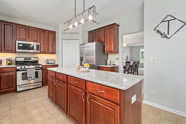 17857 Wilker Dr, Lockport, IL 60441 - kitchen with appliances with stainless steel finishes, backsplash, pendant lighting, and light tile patterned floors