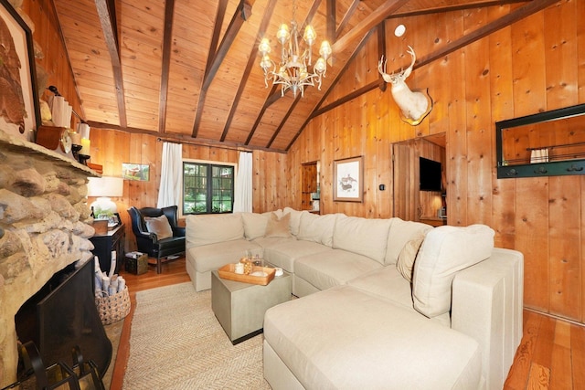 3720 E Lake Shore Dr, Wonder Lake, IL 60097 - living area featuring light wood finished floors, wooden walls, a wood ceiling with exposed beams, a chandelier, and high vaulted ceiling