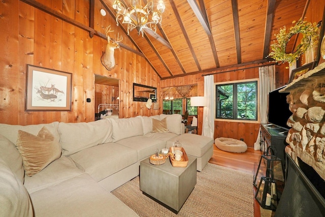 3720 E Lake Shore Dr, Wonder Lake, IL 60097 - living area with wooden walls, a wooden ceiling with exposed beams, wood finished floors, a chandelier, and high vaulted ceiling