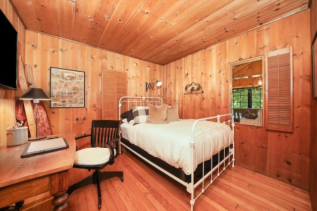 3720 E Lake Shore Dr, Wonder Lake, IL 60097 - bedroom with wooden walls, wood ceiling, and wood-type flooring