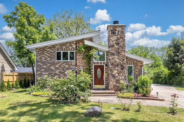 1649 Larry Ln, Glendale Heights, IL 60139 - mid-century modern home with brick siding and a chimney