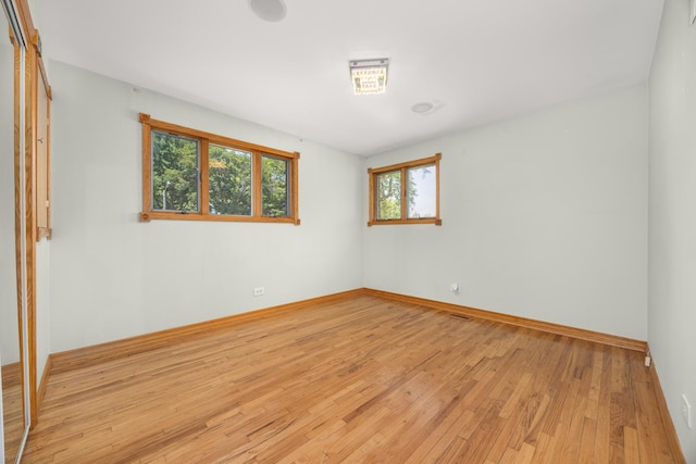 1649 Larry Ln, Glendale Heights, IL 60139 - unfurnished room with light wood-style floors and baseboards