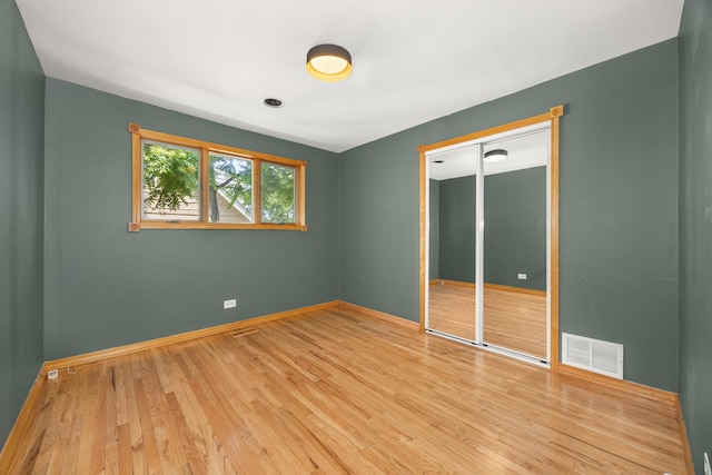 1649 Larry Ln, Glendale Heights, IL 60139 - spare room featuring wood finished floors and baseboards