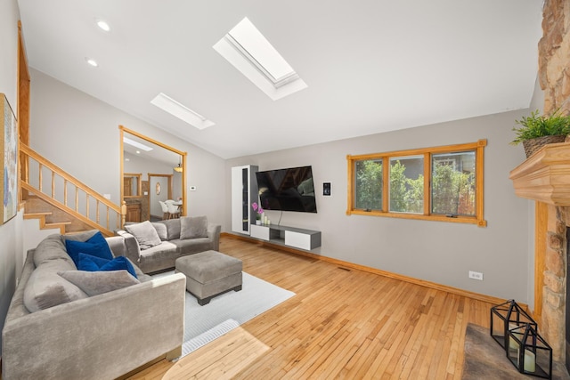1649 Larry Ln, Glendale Heights, IL 60139 - living area featuring a skylight, vaulted ceiling, hardwood / wood-style floors, recessed lighting, and stairway