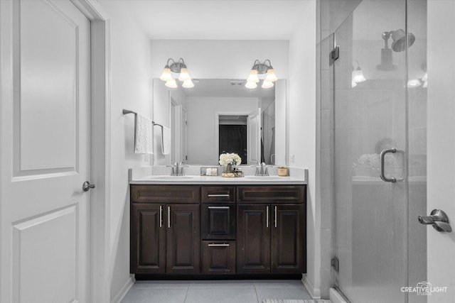 229 Lakeshore Dr, Oswego, IL 60543 - bathroom with a stall shower, double vanity, and tile patterned floors