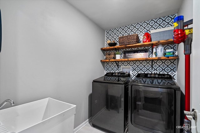 229 Lakeshore Dr, Oswego, IL 60543 - washroom with washer and dryer and baseboards