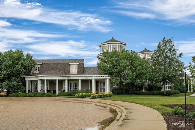 229 Lakeshore Dr, Oswego, IL 60543 - view of front facade featuring a front yard, french doors, and a porch