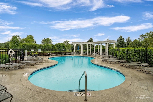 229 Lakeshore Dr, Oswego, IL 60543 - community pool with a pergola, a patio, and view of wooded area