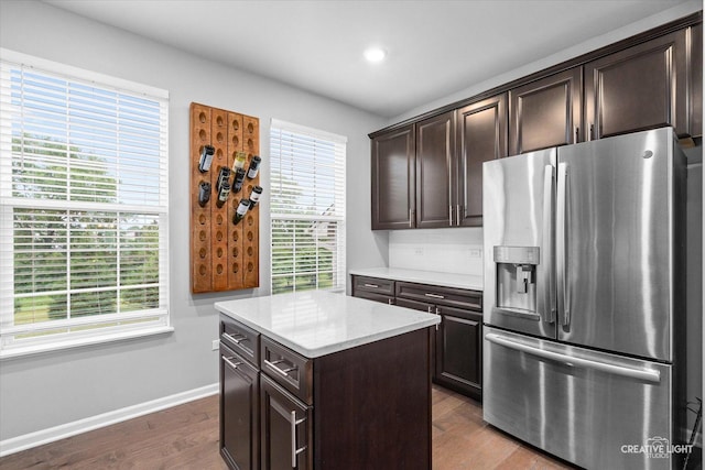 229 Lakeshore Dr, Oswego, IL 60543 - kitchen featuring stainless steel fridge, healthy amount of natural light, dark wood finished floors, dark brown cabinets, and recessed lighting