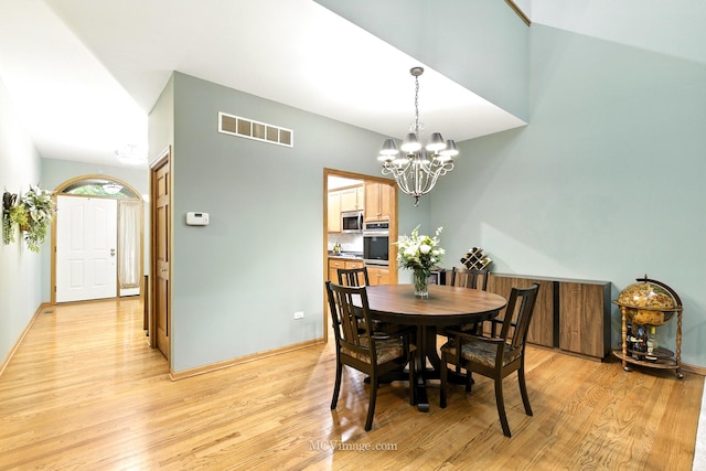 21730 Higley Ln, Frankfort, IL 60423 - dining room featuring a chandelier and light wood finished floors