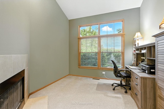 21730 Higley Ln, Frankfort, IL 60423 - office area featuring carpet flooring, a tiled fireplace, and lofted ceiling