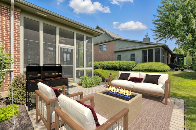 21730 Higley Ln, Frankfort, IL 60423 - view of patio with a sunroom and an outdoor living space with a fire pit