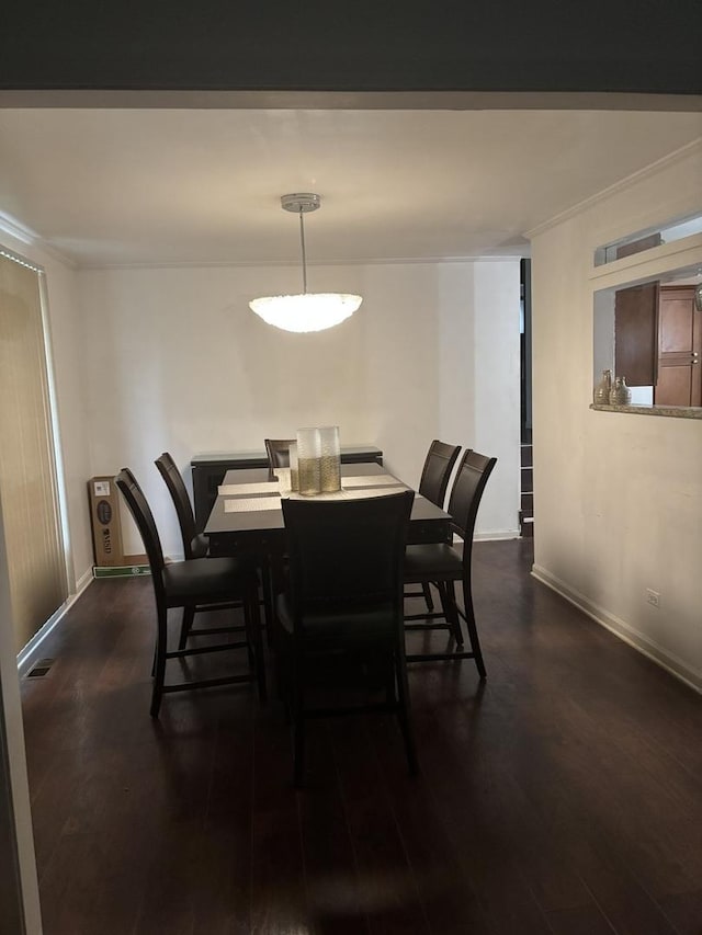 744 Academy Ave, Matteson, IL 60443 - dining room featuring dark wood-style floors and ornamental molding