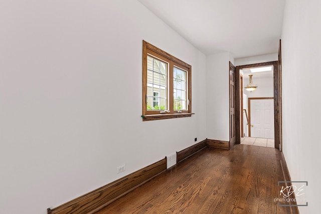 330 S Maple St, Itasca, IL 60143 - empty room featuring wood finished floors and baseboards