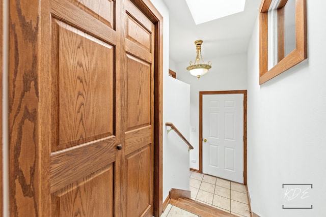 330 S Maple St, Itasca, IL 60143 - entryway featuring a skylight and light tile patterned flooring