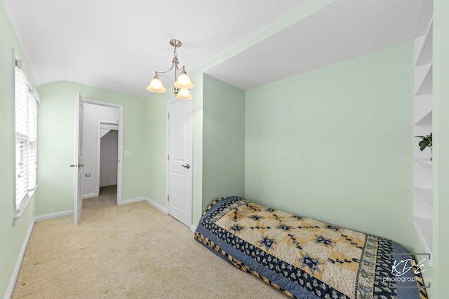 330 S Maple St, Itasca, IL 60143 - carpeted bedroom with a chandelier and baseboards
