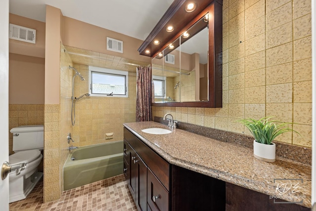 330 S Maple St, Itasca, IL 60143 - bathroom with tile walls, shower / tub combo, vanity, and tile patterned flooring