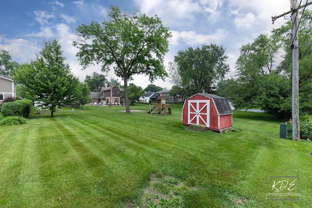 330 S Maple St, Itasca, IL 60143 - view of grassy yard with a storage shed and a playground