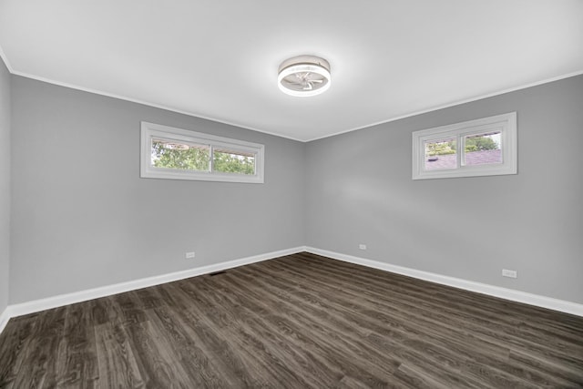 3115 172nd St, Hazel Crest, IL 60429 - spare room featuring ornamental molding, plenty of natural light, and dark wood-type flooring
