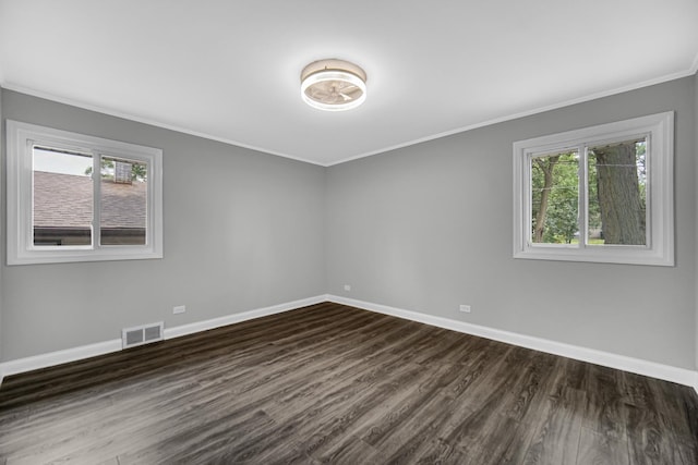 3115 172nd St, Hazel Crest, IL 60429 - spare room with healthy amount of natural light, dark wood finished floors, and ornamental molding